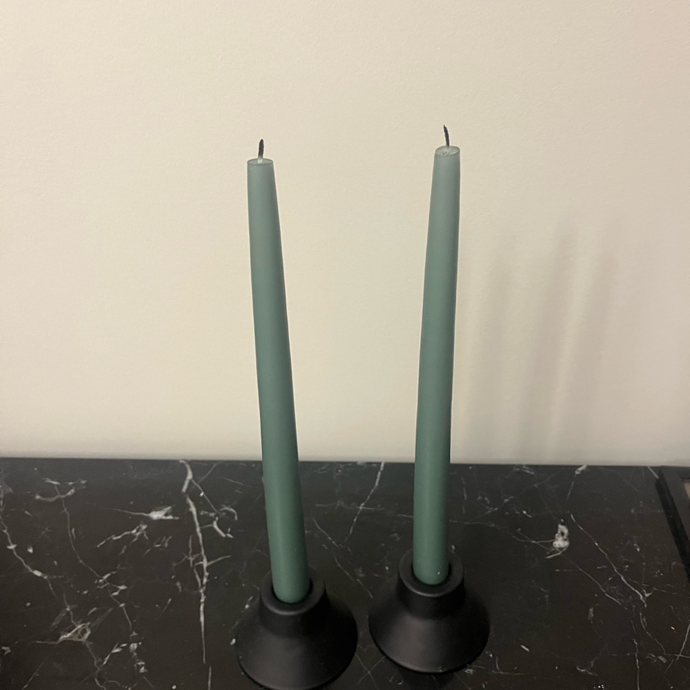 Elegant Green Candles with Black Holders